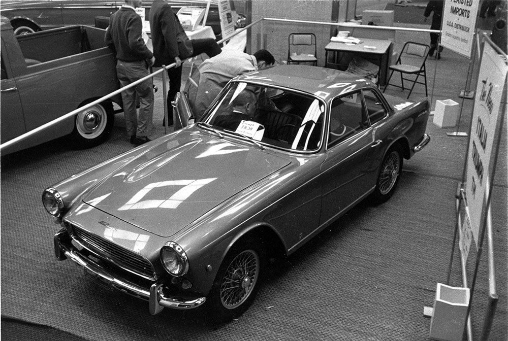 Italia at the 1961 New York Auto Show. You can just see the back of Stutz Plaisted's head in the passenger seat. Photo by Bill Baker.